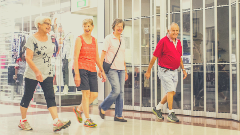 2 couples mall walking for fitness