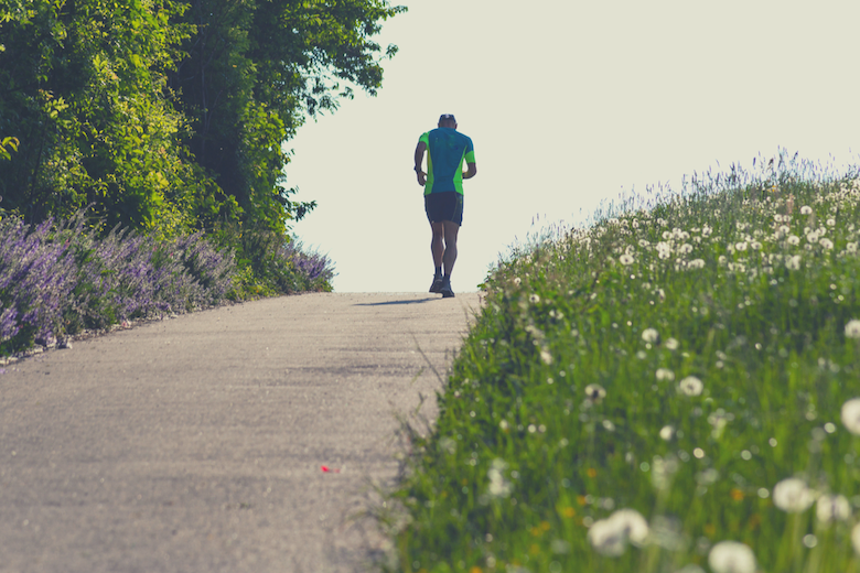 Man running uphill instead of exercising on the best vertical climber