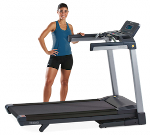 girl standing behind the Lifespan TR3000i treadmill