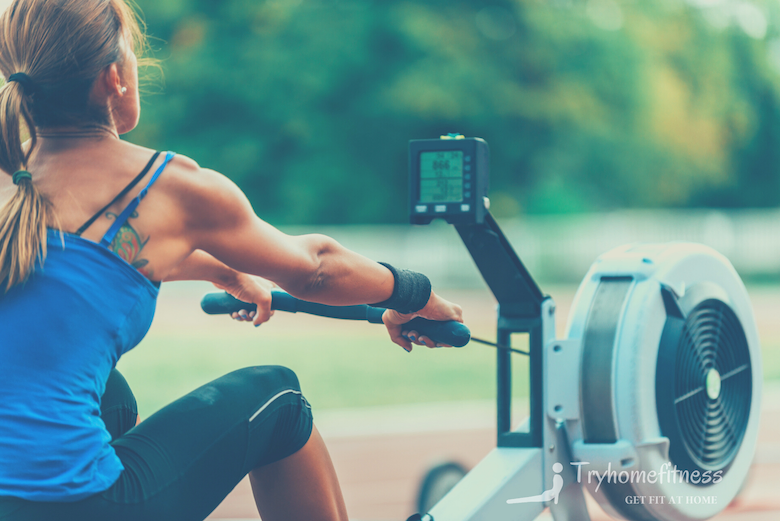 Girl outside on rowing machine