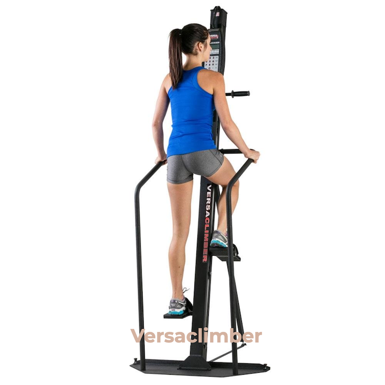 Woman on a vertical climber the Versaclimber