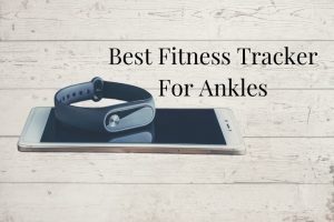 Best ankle fitness tracker with smartphone on wood background