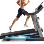 Man (torso) running on NordicTrack 2950 treadmill